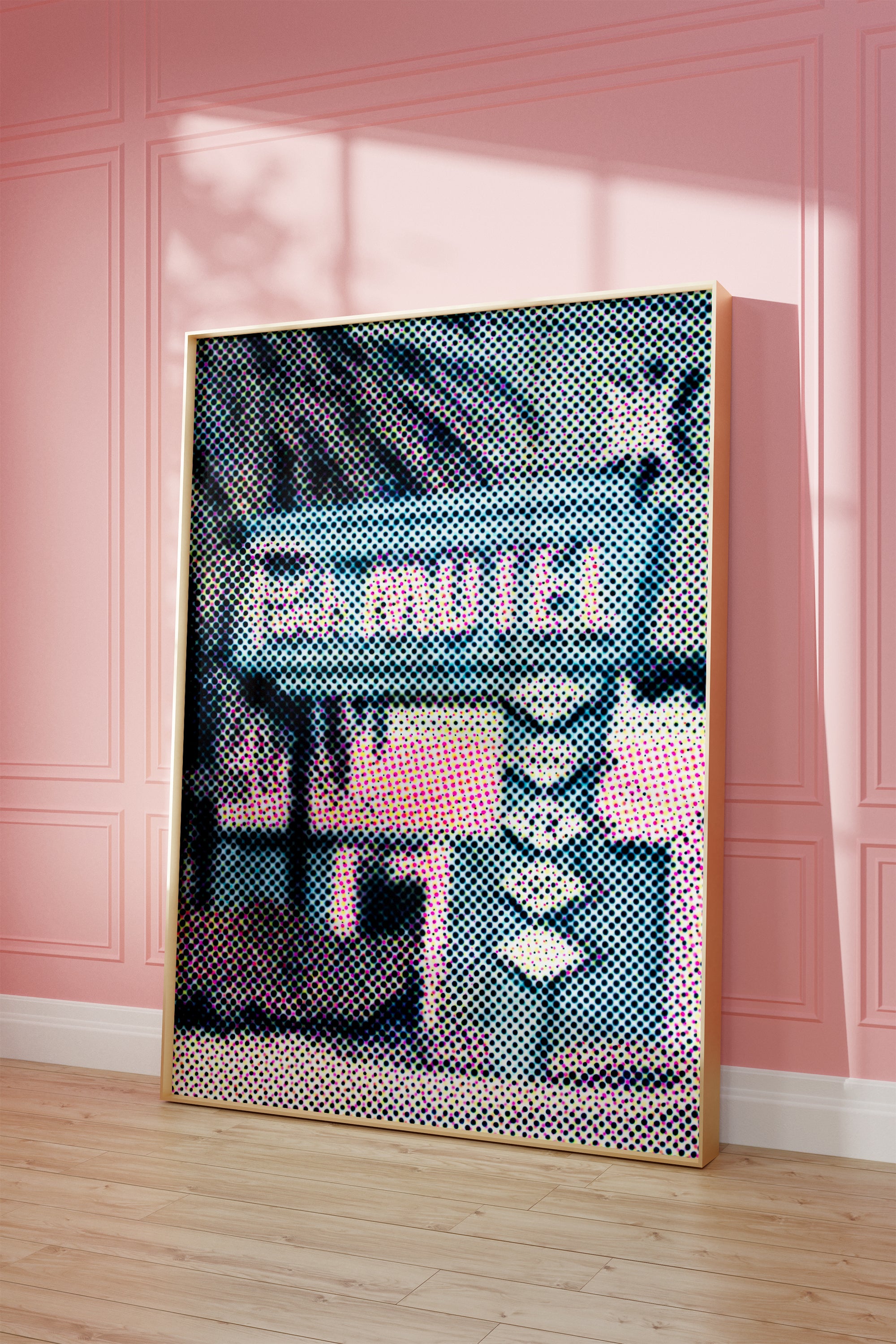 Framed artwork of the famous 'Pink Motel' Sign rendered in a CMYK Halftone on a on a pink wall. 